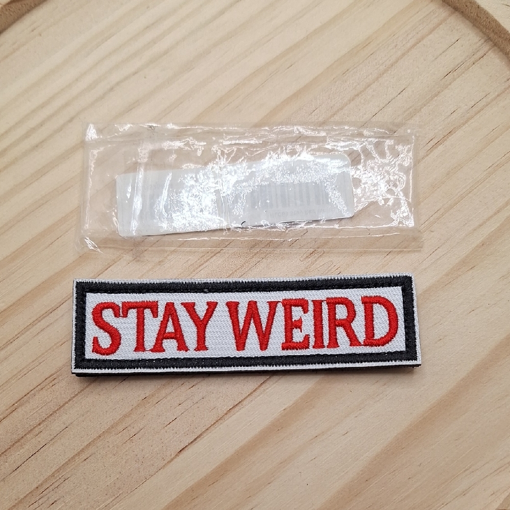 Stay Weird Patch with Red and Black Text